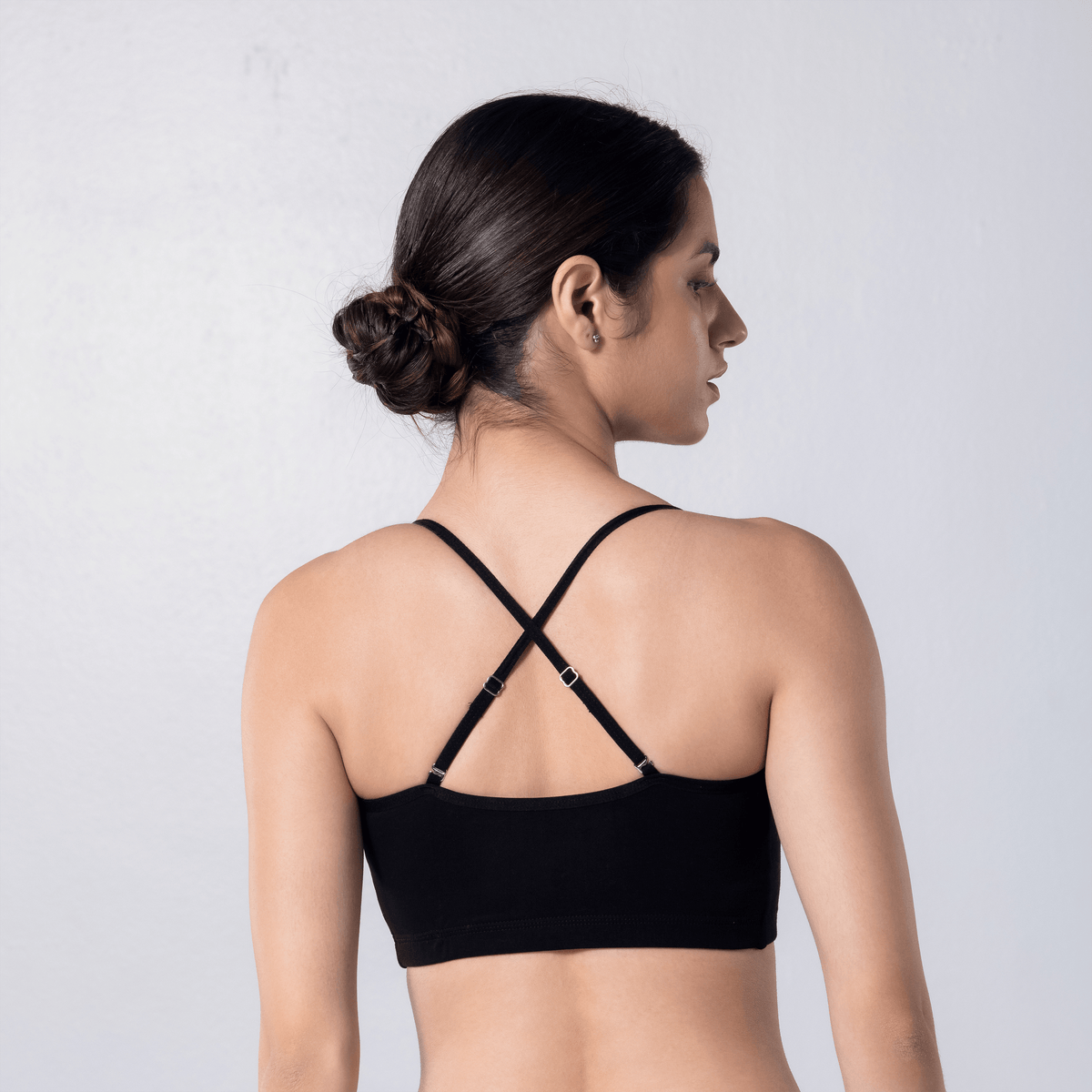 Blush Trendy Top Bra in Black, X-back view worn by model.