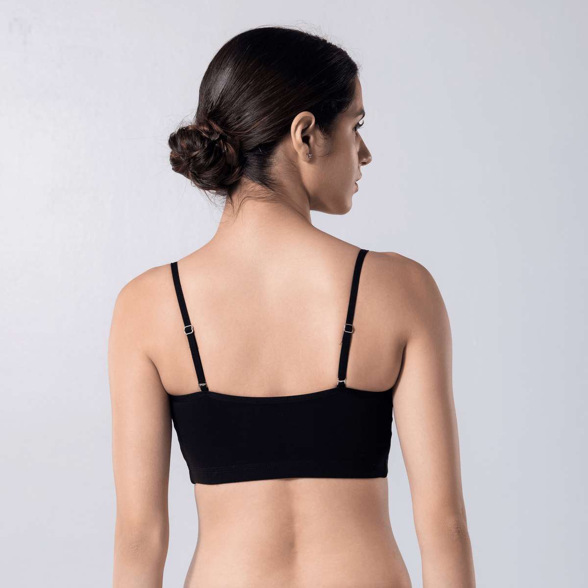 Blush Trendy Top Bra in Black, U-back view worn by model.