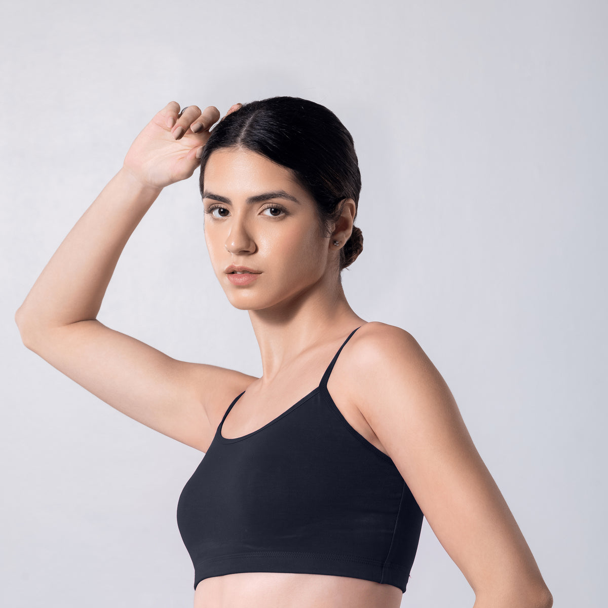Blush Trendy Top Bra in Navy, side view worn by model.